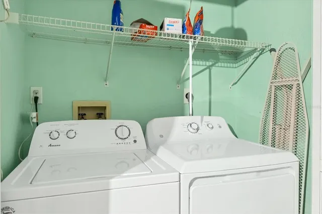 a utility room with dryer and washer