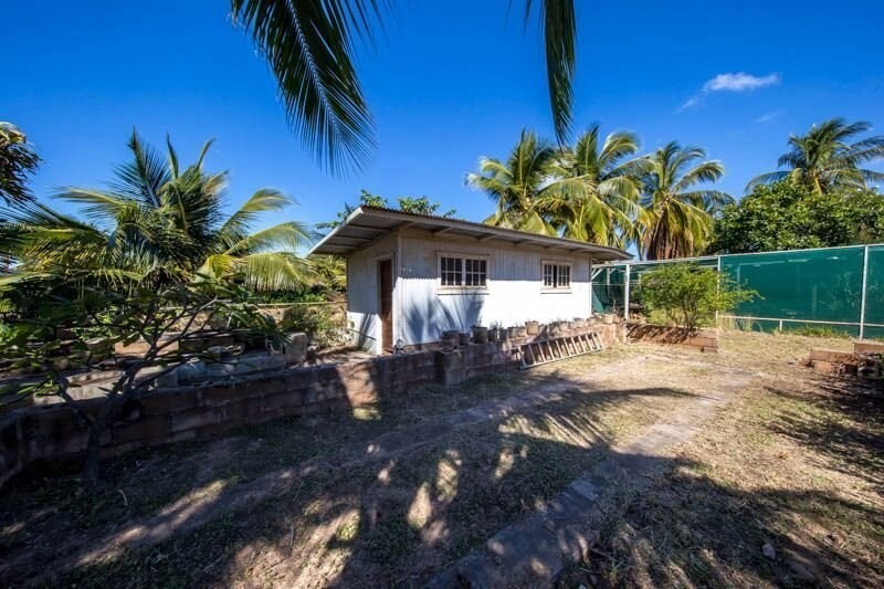 8589 Elepaio Road Kekaha, HI 96752 - Photo 11 of 16 a view of a house with backyard and sitting area