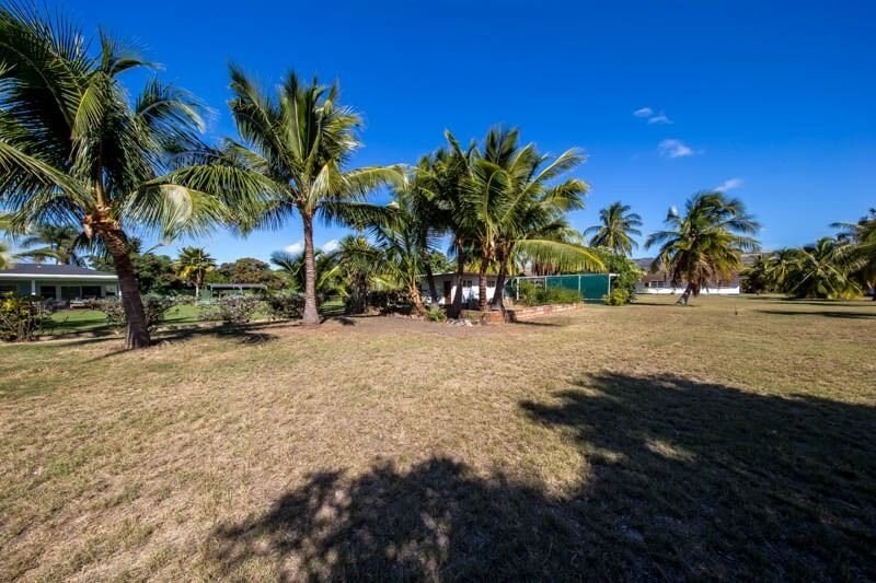 8589 Elepaio Road Kekaha, HI 96752 - Photo 15 of 16 a view of road and trees