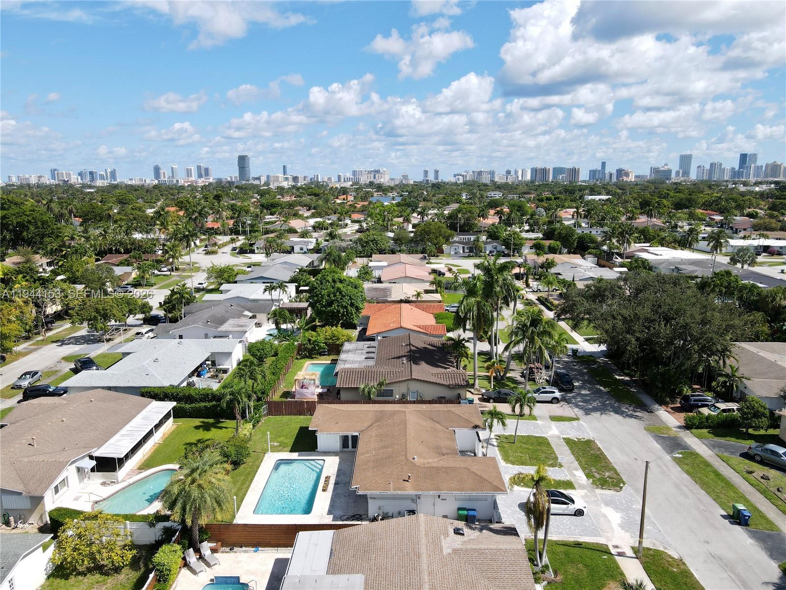 1881 Northeast 210th Street Miami, FL 33179 - Photo 27 of 29 an aerial view of residential houses with outdoor space