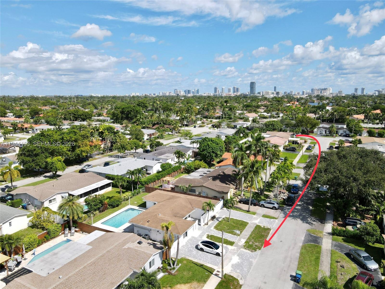 1881 Northeast 210th Street Miami, FL 33179 - Photo 28 of 29 an aerial view of residential houses with outdoor space
