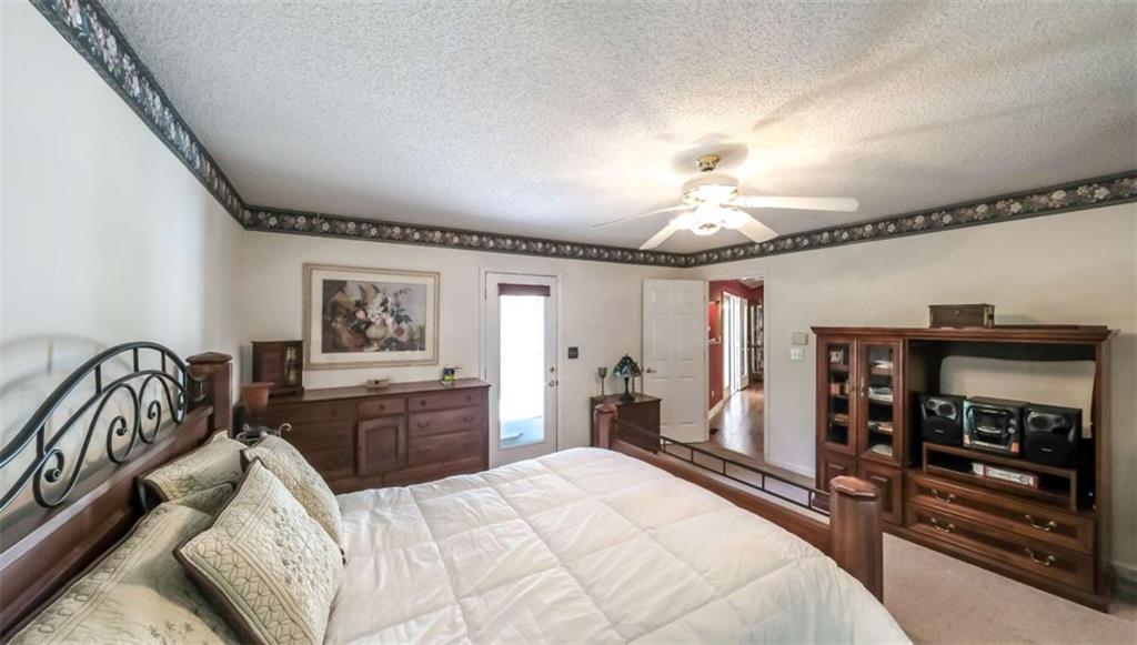 396 Pam Street Wedowee, AL 36278 - Photo 17 of 48 a bedroom with a bed and a dresser