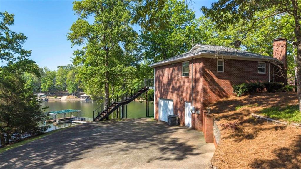 396 Pam Street Wedowee, AL 36278 - Photo 3 of 48 a view of a house with a yard