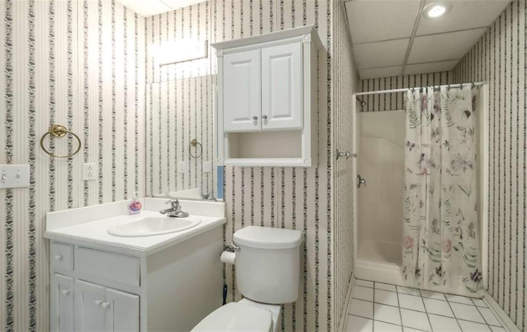 396 Pam Street Wedowee, AL 36278 - Photo 31 of 48 a bathroom with a sink toilet and shower