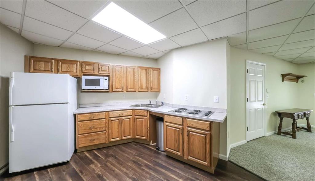 396 Pam Street Wedowee, AL 36278 - Photo 35 of 48 a kitchen with a sink appliances and cabinets