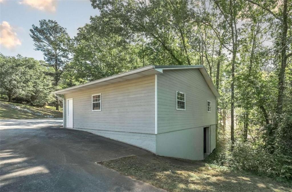 396 Pam Street Wedowee, AL 36278 - Photo 40 of 48 a view of a small house with a yard