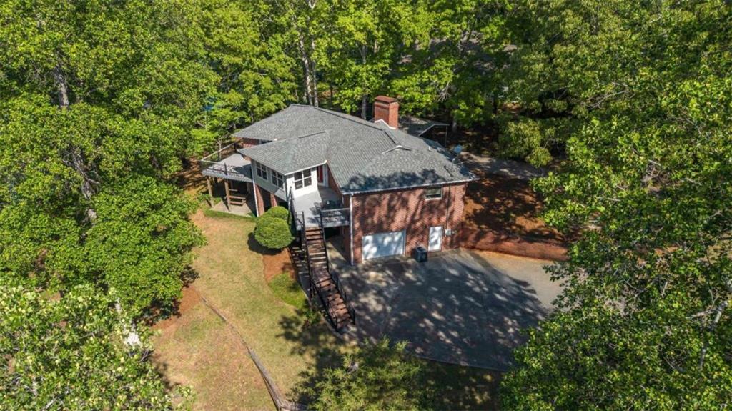 396 Pam Street Wedowee, AL 36278 - Photo 4 of 48 a view of a house with a yard