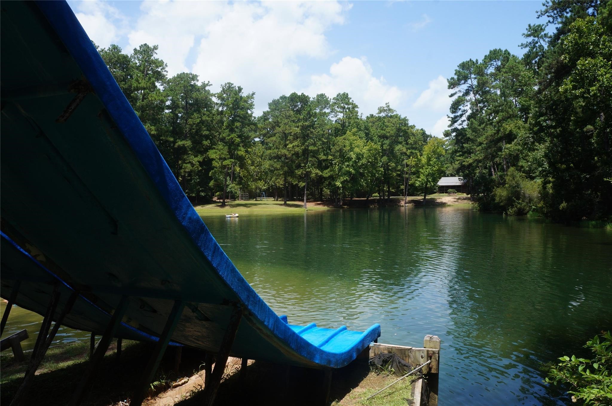 37 Robin Hood Cleveland, TX 77327 - Photo 13 of 20 a view of a lake from a balcony