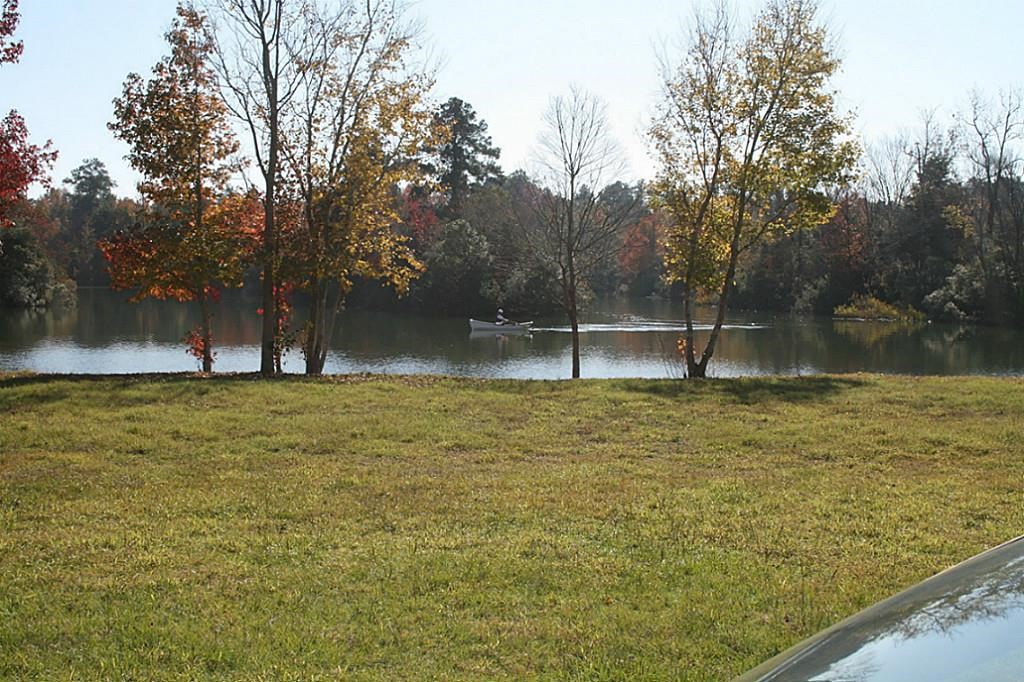 37 Robin Hood Cleveland, TX 77327 - Photo 2 of 20 a view of outdoor space with pool and trees