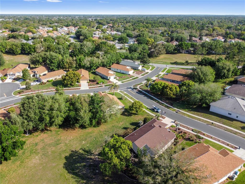 70 Center Oak Circle Spring Hill, FL 34609 - Photo 11 of 58 an aerial view of residential houses with outdoor space
