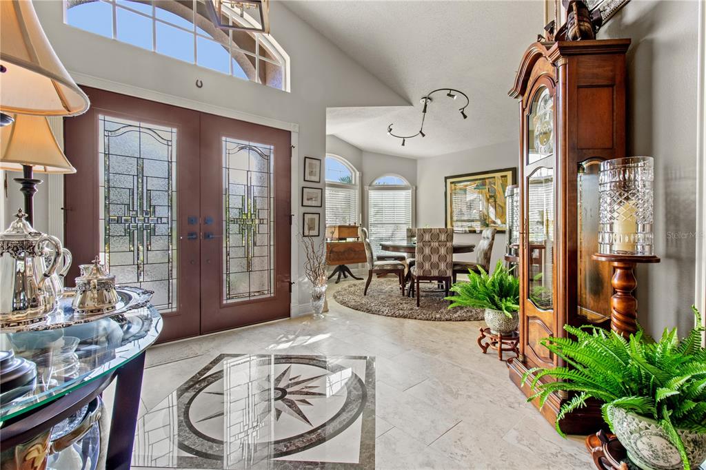 70 Center Oak Circle Spring Hill, FL 34609 - Photo 14 of 58 a view of a livingroom with furniture and a floor to ceiling window