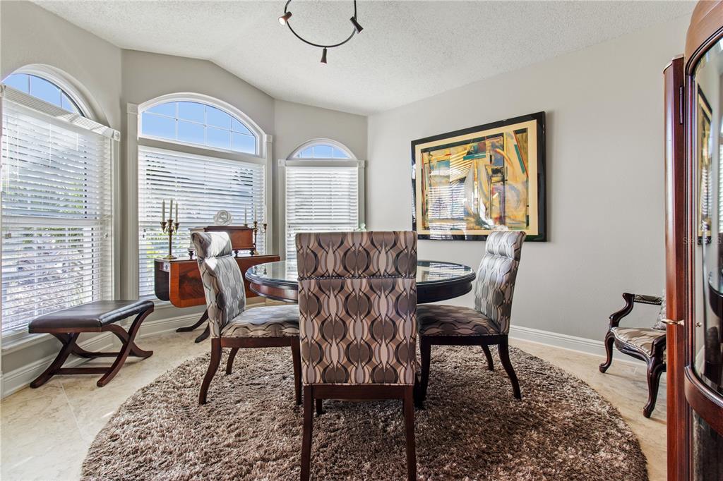 70 Center Oak Circle Spring Hill, FL 34609 - Photo 17 of 58 a view of a livingroom and dining room