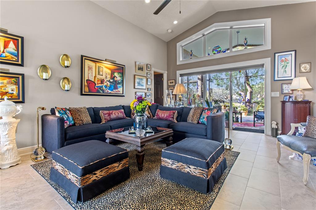 70 Center Oak Circle Spring Hill, FL 34609 - Photo 20 of 58 a living room with furniture and a large window