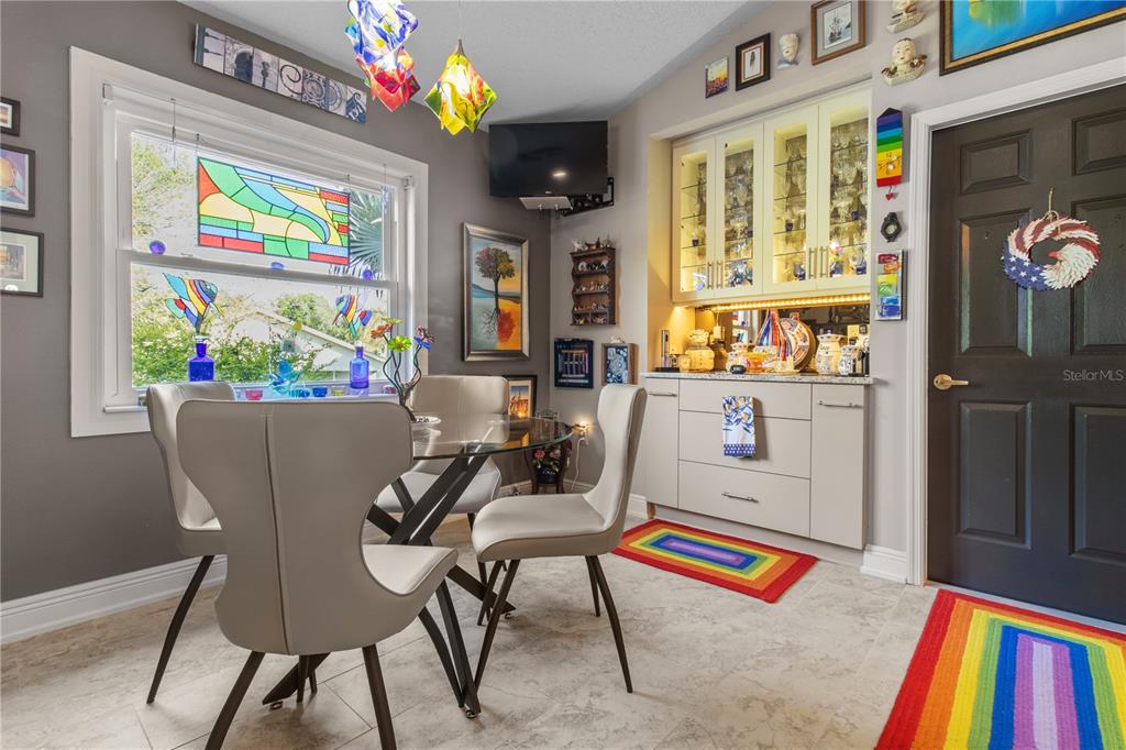 70 Center Oak Circle Spring Hill, FL 34609 - Photo 25 of 58 a living room with furniture and a flat screen tv