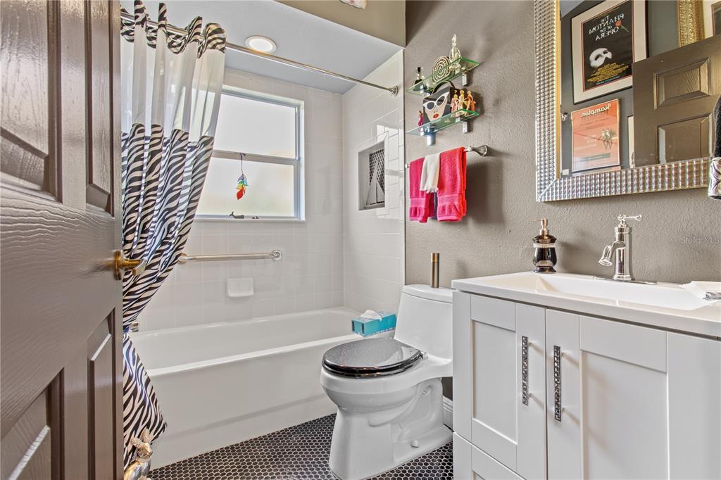 70 Center Oak Circle Spring Hill, FL 34609 - Photo 37 of 58 a bathroom with a sink toilet and shower