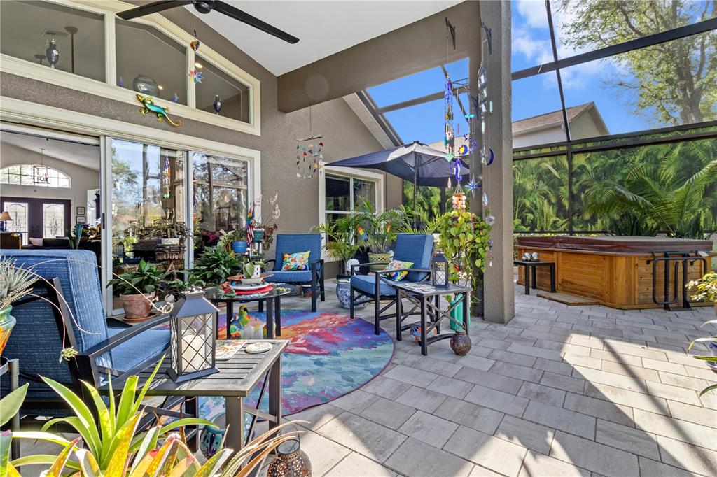 70 Center Oak Circle Spring Hill, FL 34609 - Photo 43 of 58 a view of a chairs and table in a patio