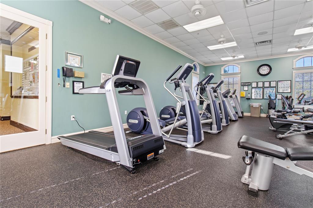 70 Center Oak Circle Spring Hill, FL 34609 - Photo 51 of 58 a view of a room with gym equipment