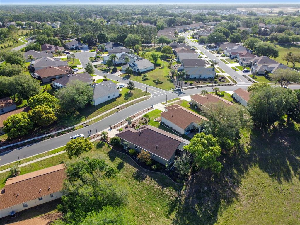 70 Center Oak Circle Spring Hill, FL 34609 - Photo 9 of 58 an aerial view of residential houses with outdoor space