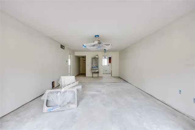 a bathroom with a shower and a sink