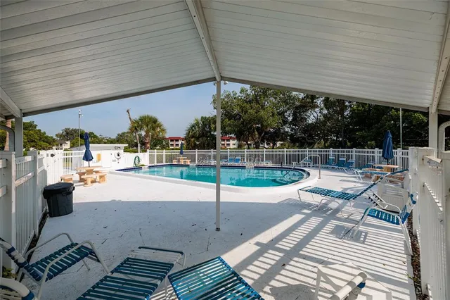 a group of people sitting in a living room
