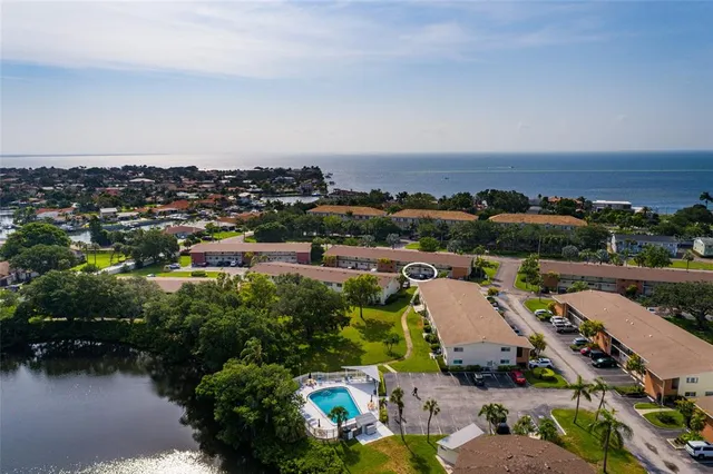 a view of a terrace with wooden floor and city view