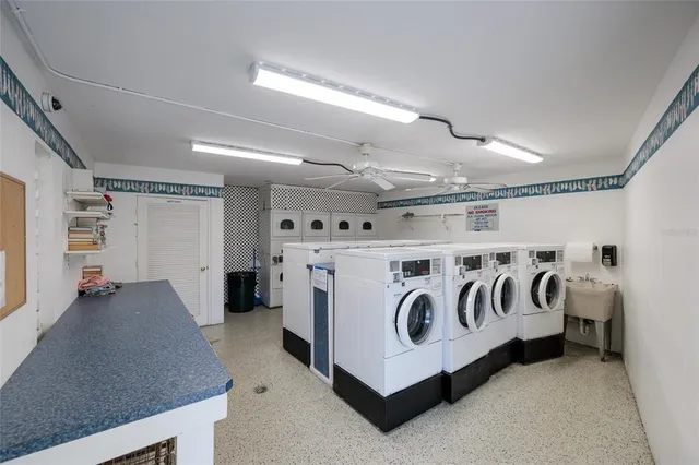 an aerial view of a house with a lake view