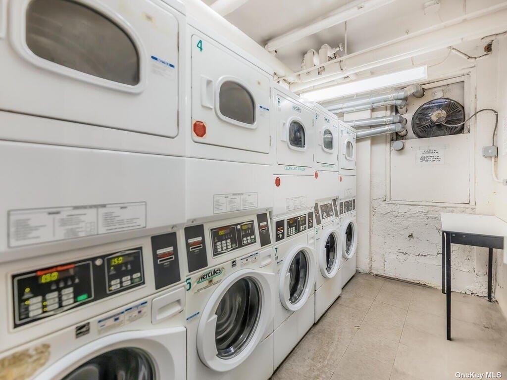 2835 Webb Avenue, Unit 7E Bronx, NY 10468 - Photo 21 of 24 a utility room with dryer and washer