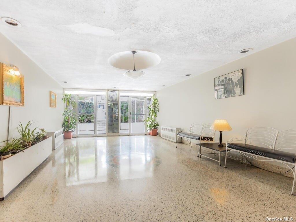 2835 Webb Avenue, Unit 7E Bronx, NY 10468 - Photo 3 of 24 a view of a living room and a ceiling fan