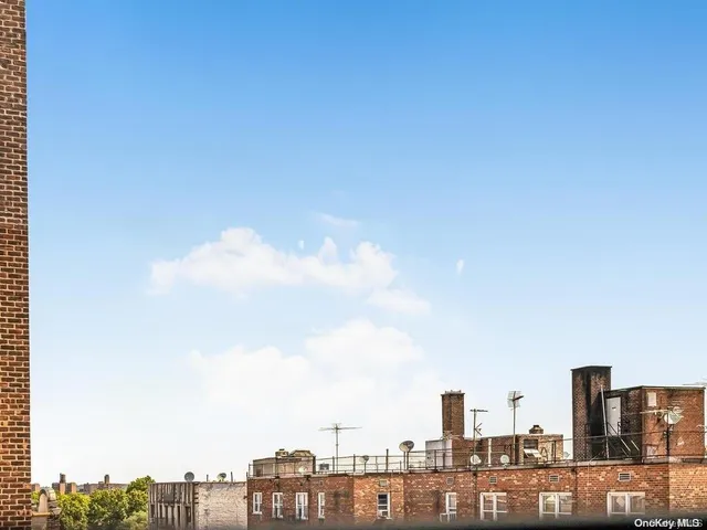 a view of a city with tall buildings in the background