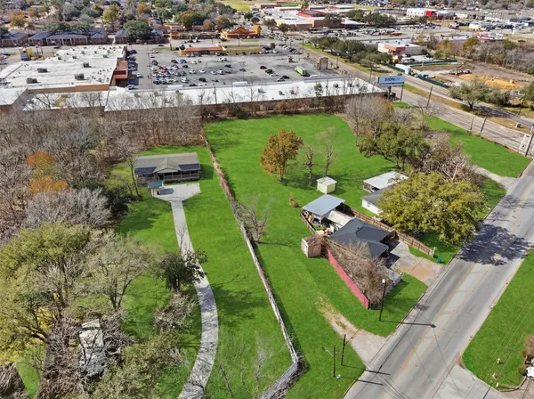 an aerial view of a house with a garden