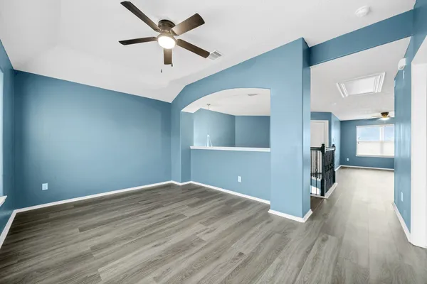 a view of a livingroom with wooden floor