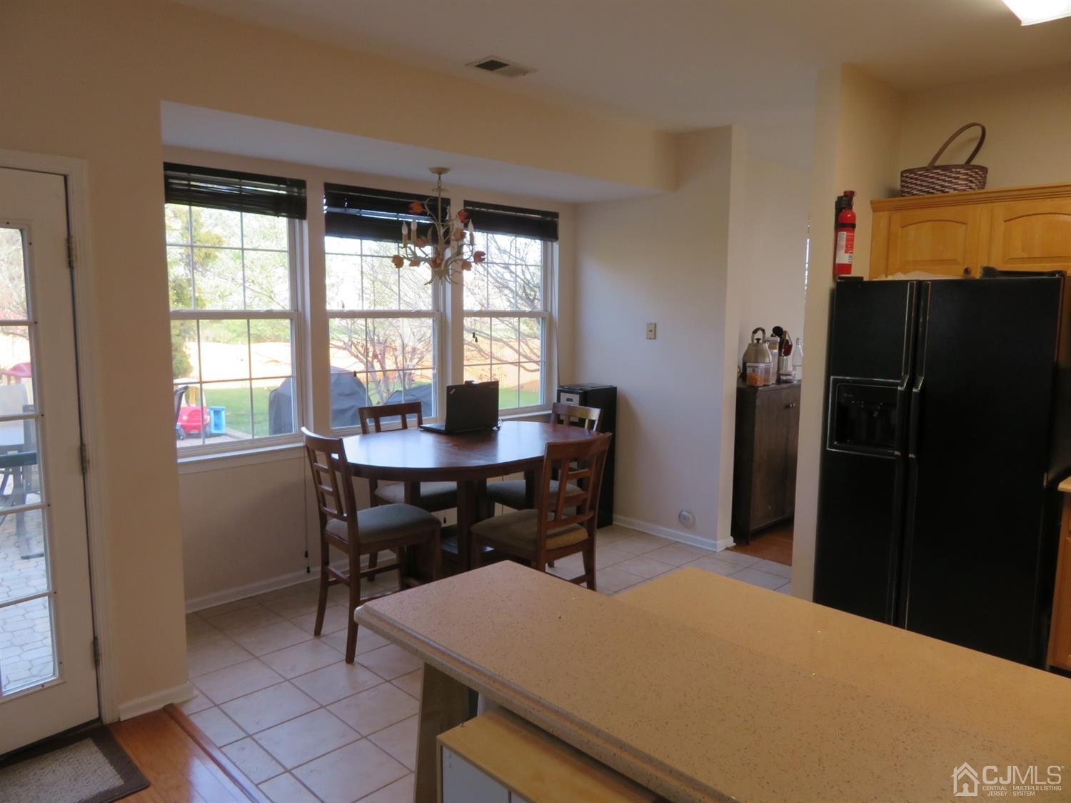 55 Devon Drive East Brunswick, NJ 08816 - Photo 6 of 28 a workspace with furniture and a window