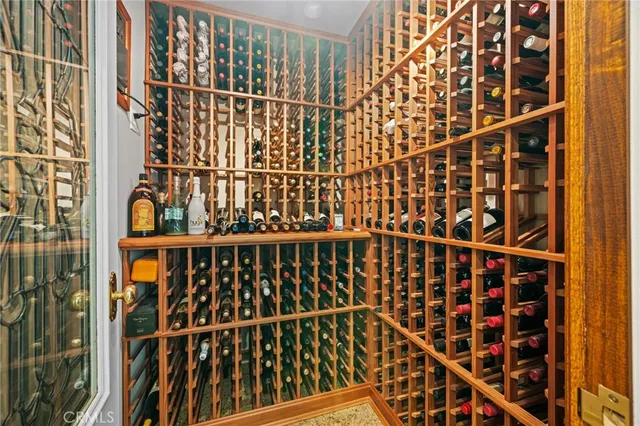 a spacious bedroom with a bed and a couch