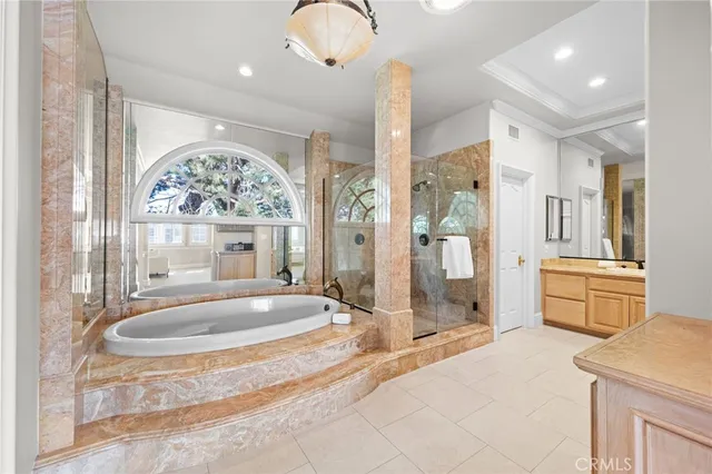 a bathroom with a sink a toilet and a window