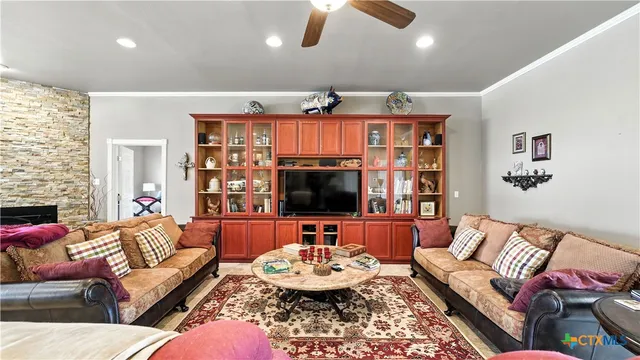 a kitchen with stainless steel appliances granite countertop a sink and stove