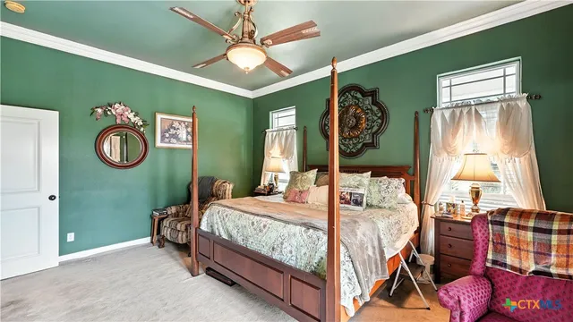 a view of a patio with couches table and chairs and potted plants
