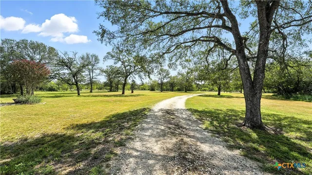a view of swimming pool with an outdoor space and seating area