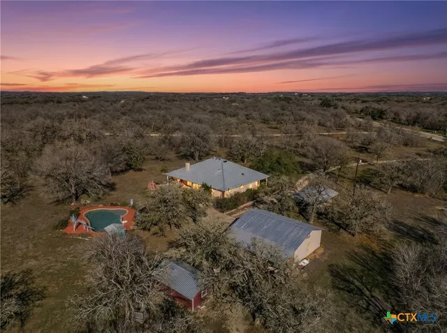 a view of a city with mountains in the background