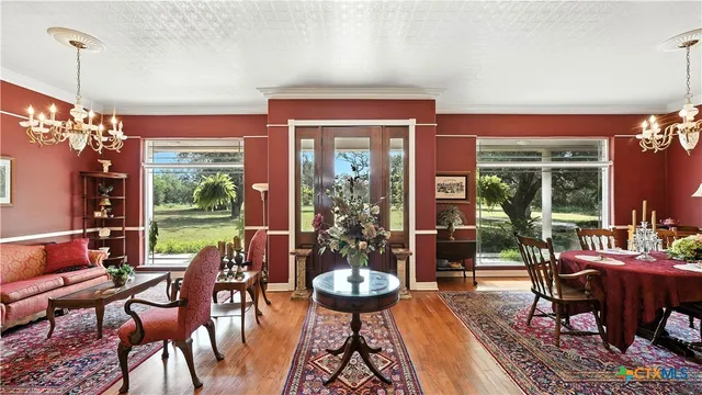 a bathroom with a sink vanity mirror and toilet