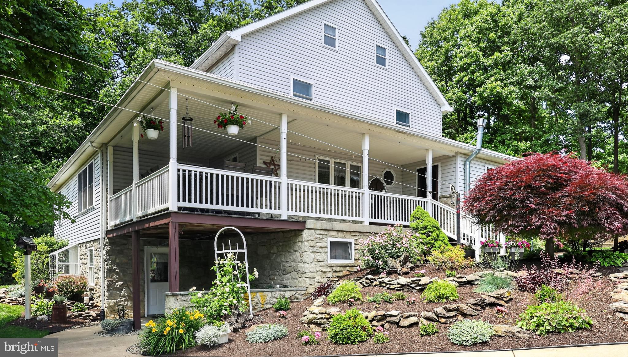 257 Hill Road New Holland, PA 17557 - Photo 32 of 94 Charming home with lush landscaping.