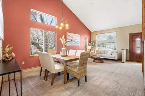 a view of a livingroom with furniture and window