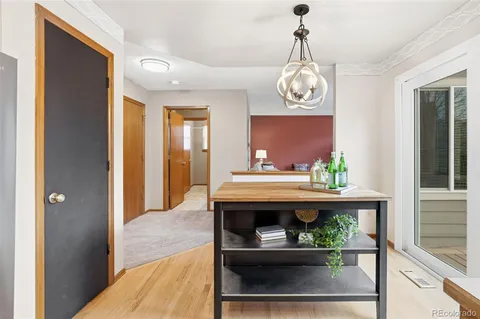 a living room with furniture a window and a fireplace