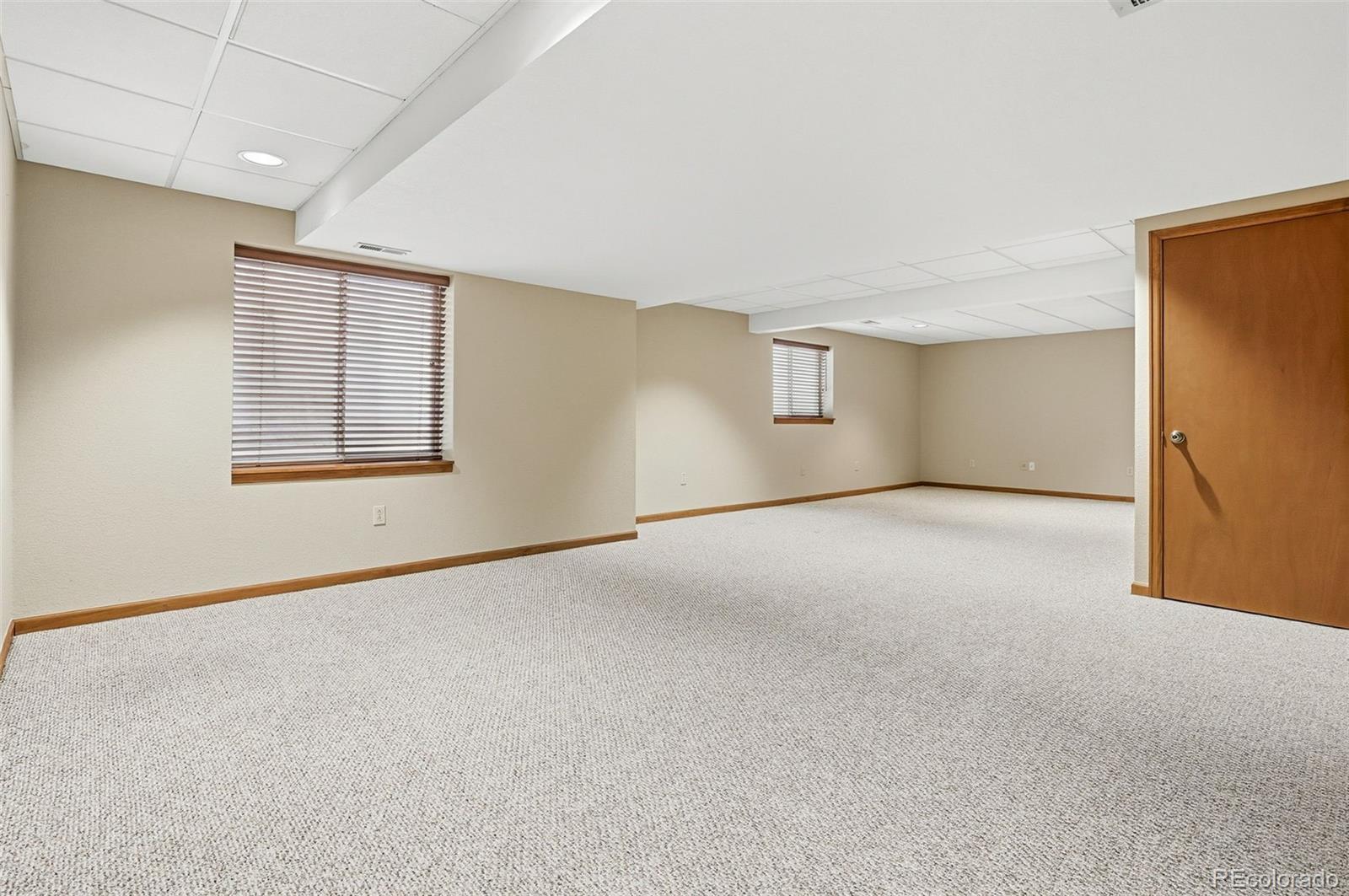 8362 Sunnyside Place Highlands Ranch, CO 80126 - Photo 41 of 50 a view of an empty room with a window