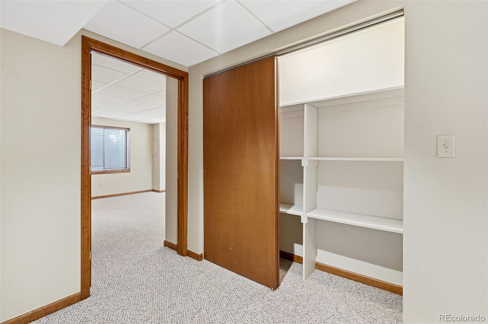 8362 Sunnyside Place Highlands Ranch, CO 80126 - Photo 42 of 50 a view of an empty room and a window