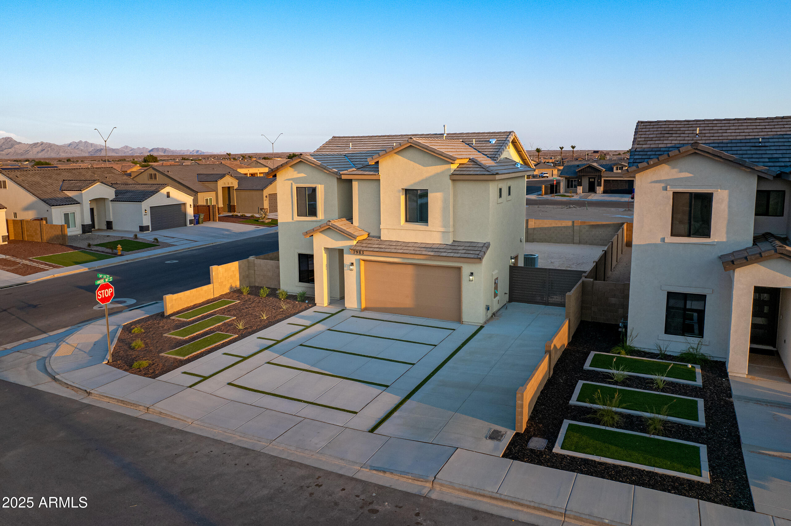 an aerial view of a house with a balcony