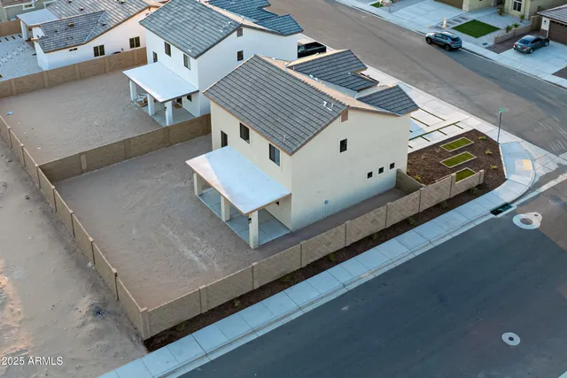 an aerial view of residential house with terrace