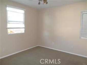 44 Duet Irvine, CA 92603 - Photo 11 of 18 an empty room with a window