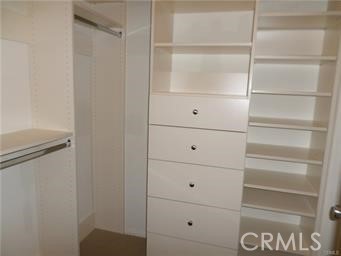 44 Duet Irvine, CA 92603 - Photo 14 of 18 a view of a closet