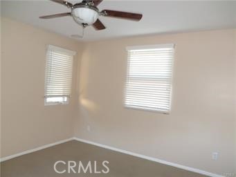 44 Duet Irvine, CA 92603 - Photo 16 of 18 a view of a bedroom with a window