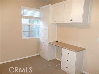 44 Duet Irvine, CA 92603 - Photo 17 of 18 a view of cabinets and window